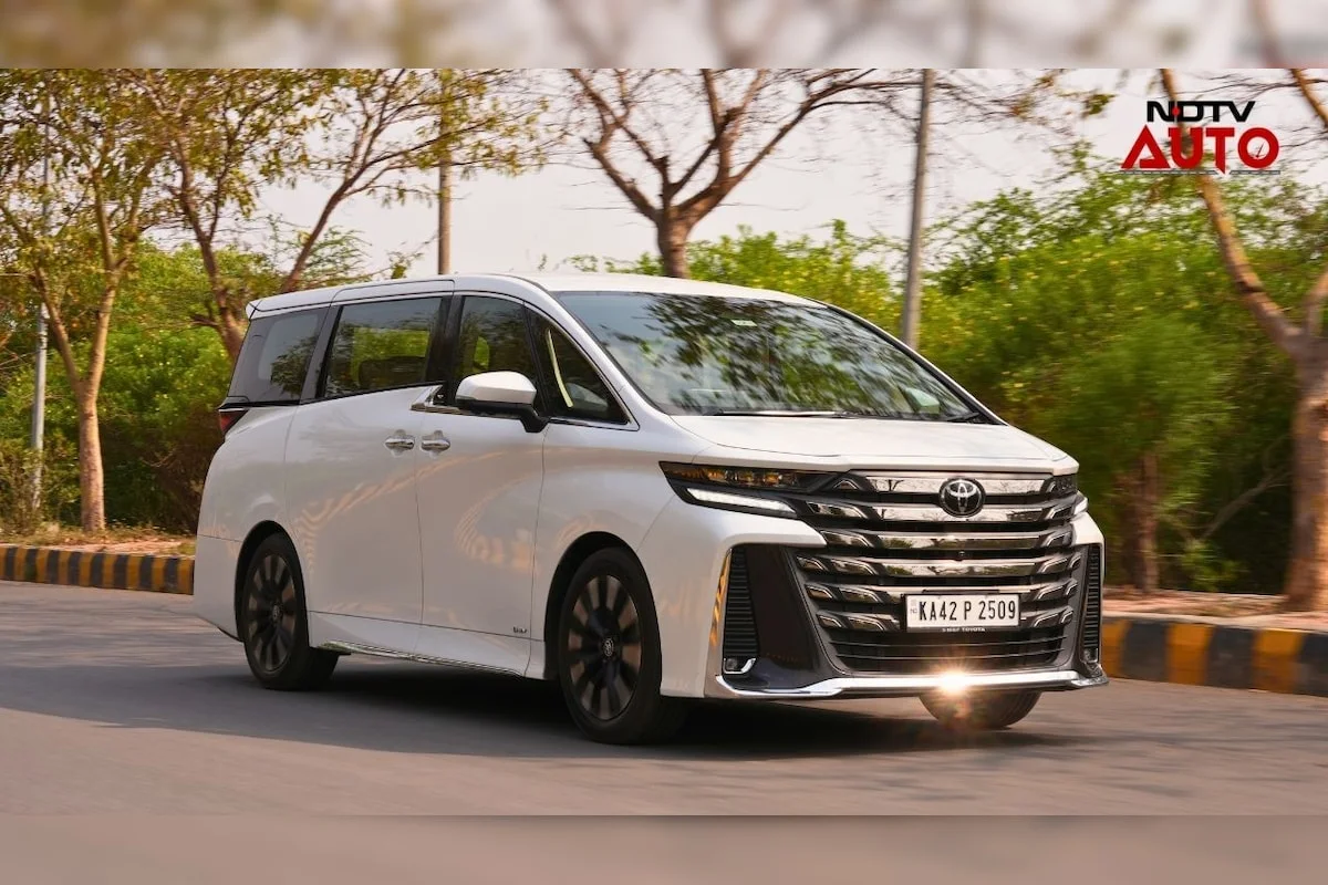 White premium minivan on the road